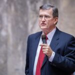 Sen. Curtis King speaks during debate on legislation on the Washington State Senate floor.